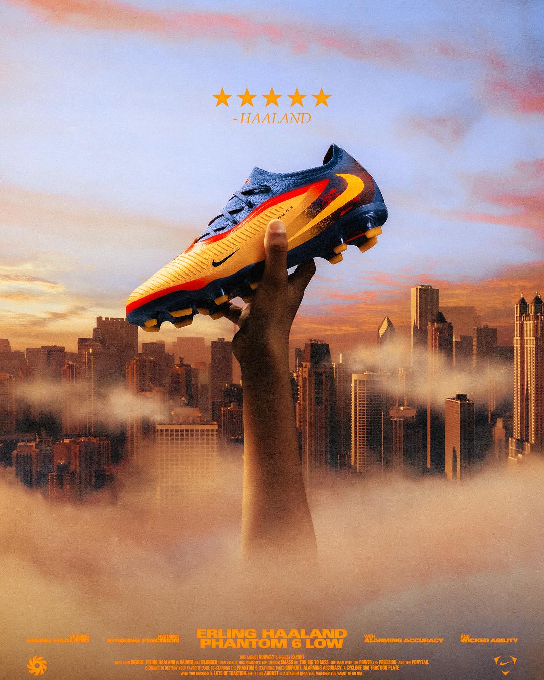 A kid holds a boot through the clouds with the city skyscrapers showing.