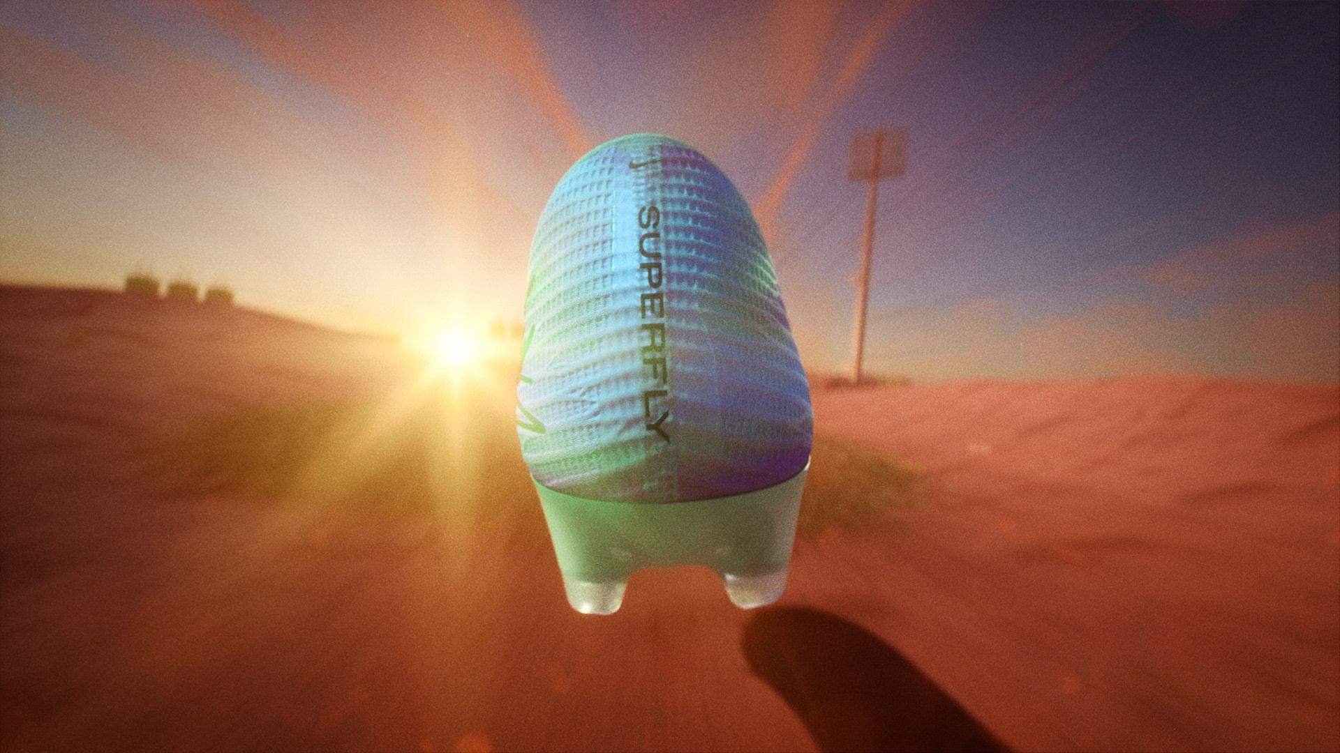 View of the boot's heel as it flies towards the goal.