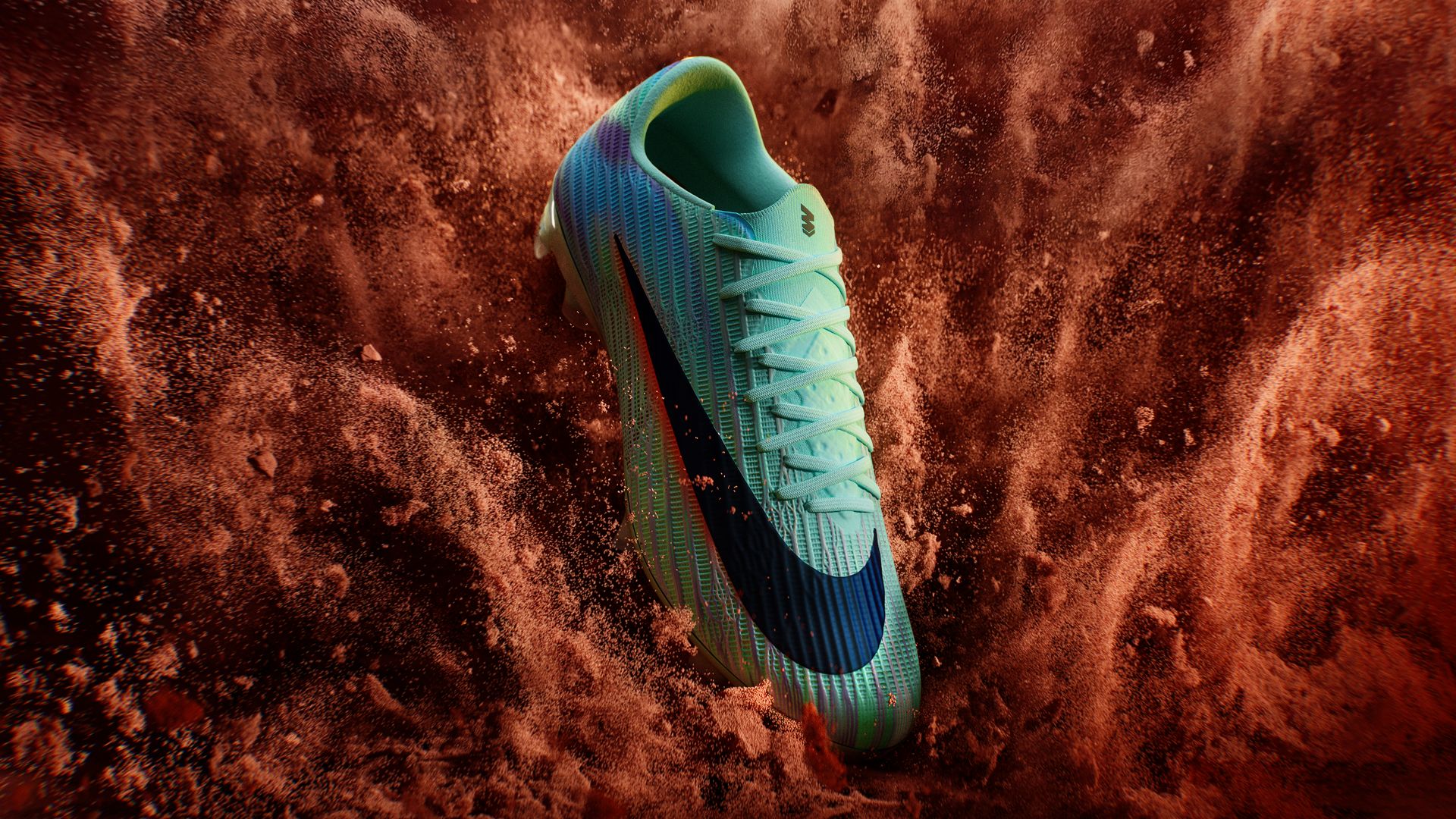 Image of Sam's football boot surrounding by exploding sand on the right.